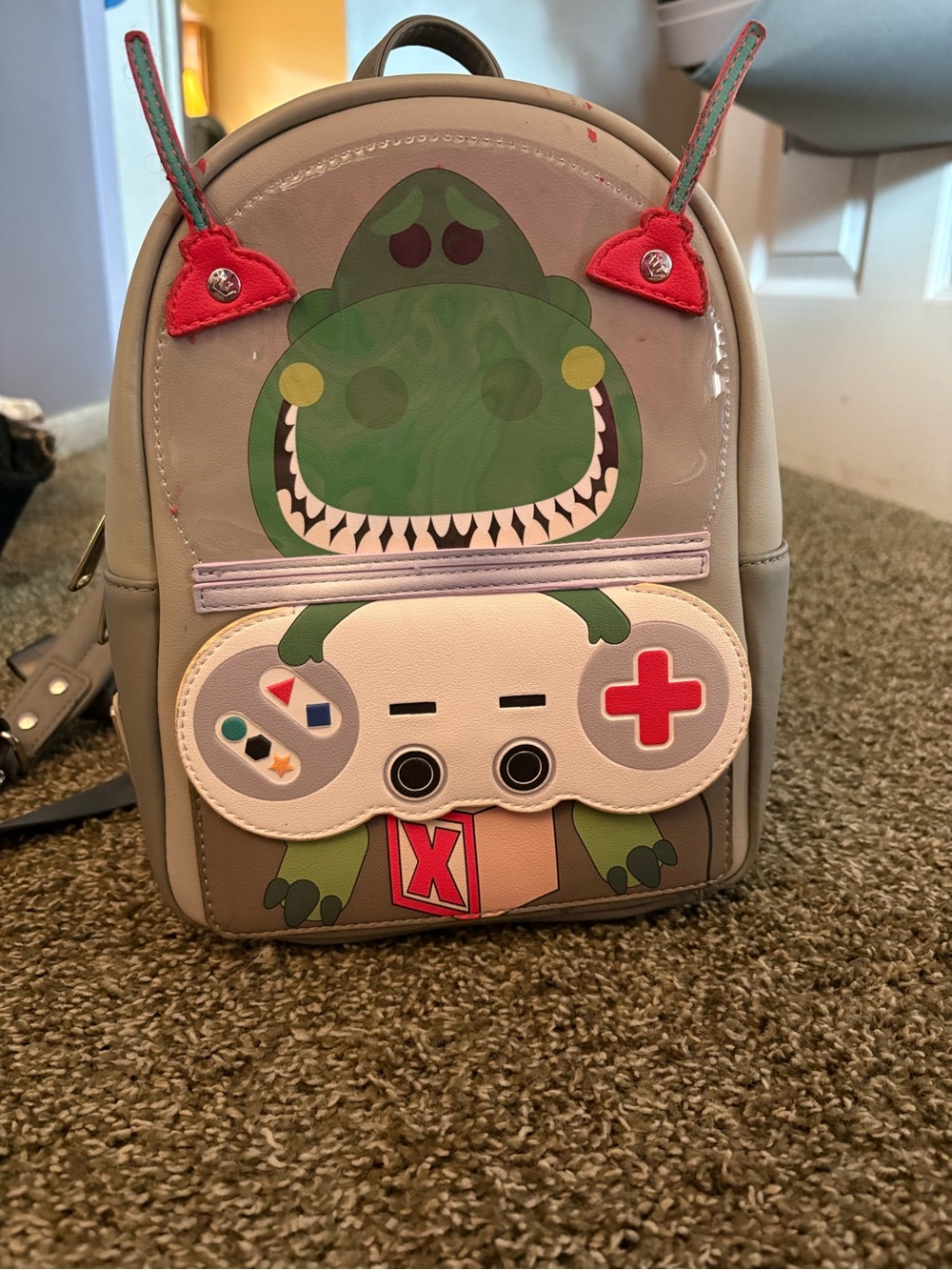 Loungefly Rex mini-backpack